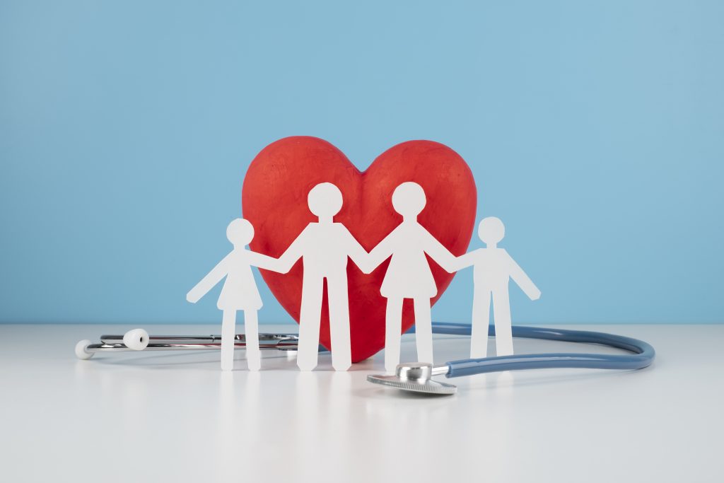 life insurance concept with paper family scaled